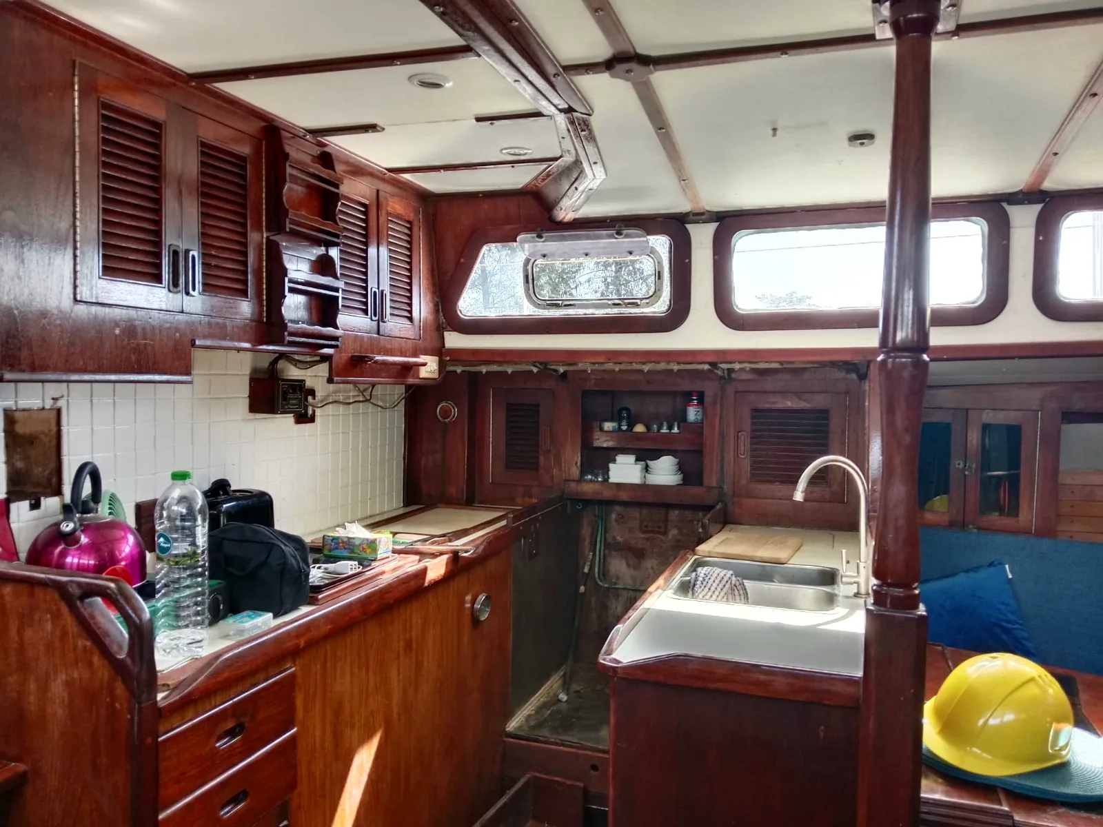 Galley mid-renovation with construction equipment