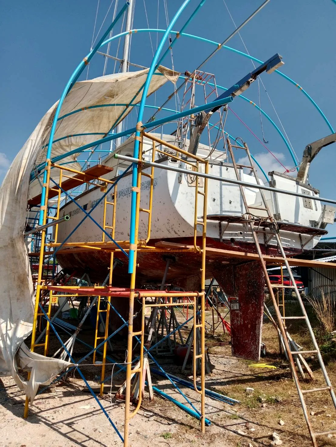 Full scaffolding and protective tent erected around yacht